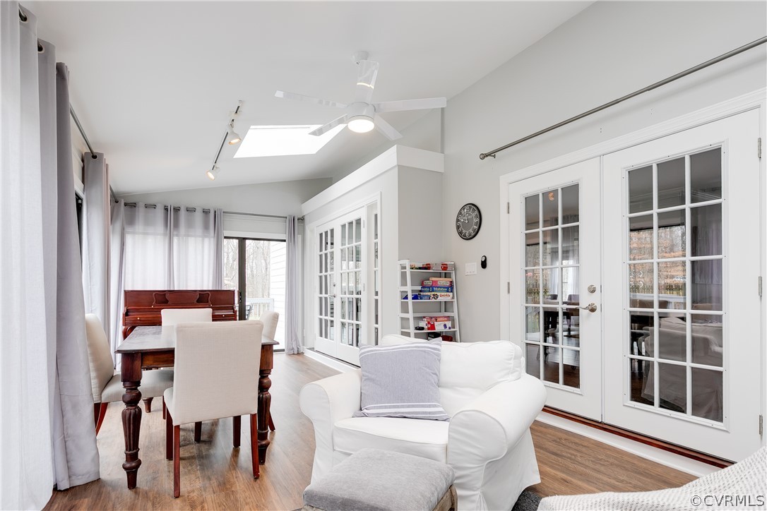 3180 East Brigstock Road Midlothian, VA 23113 - Photo 27 of 50 a living room with furniture and large windows