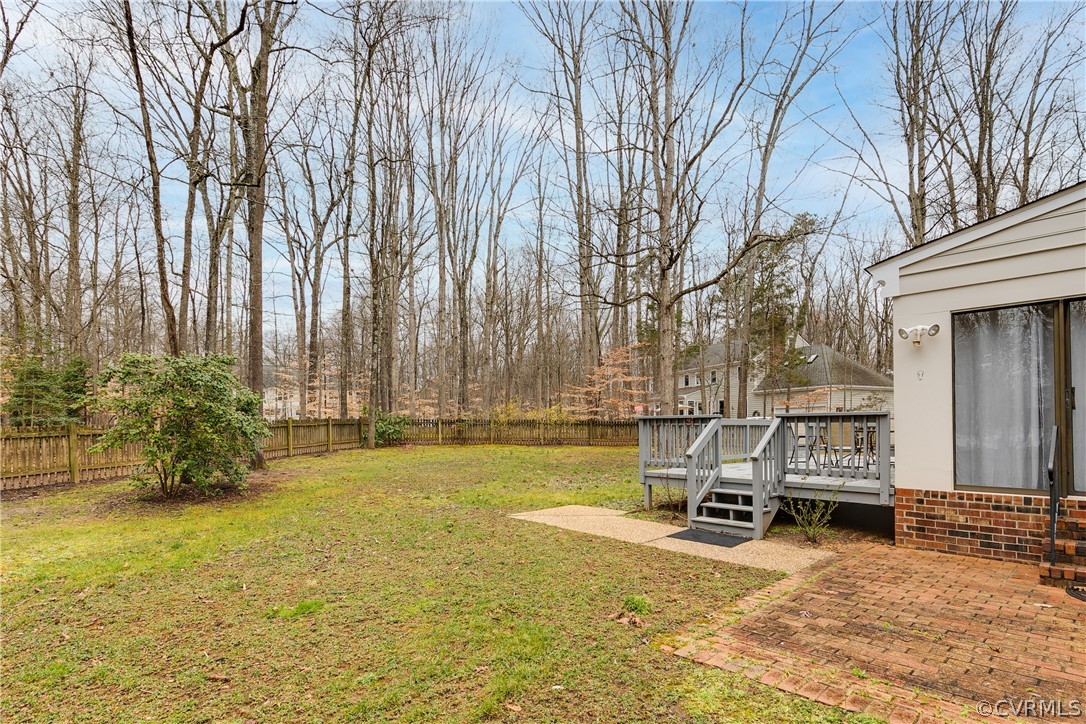 3180 East Brigstock Road Midlothian, VA 23113 - Photo 49 of 50 a view of a house with backyard and sitting area