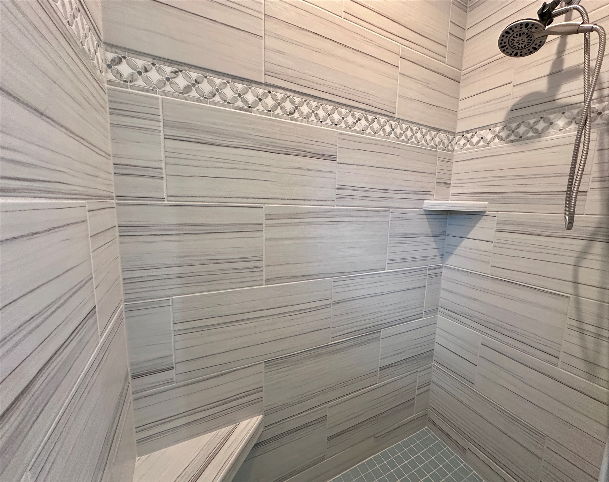 124 Pine Path Bastrop, TX 78602 - Photo 17 of 31 Spare Bathroom with tiled shower