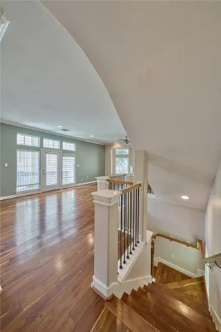 a view of entryway with wooden floor