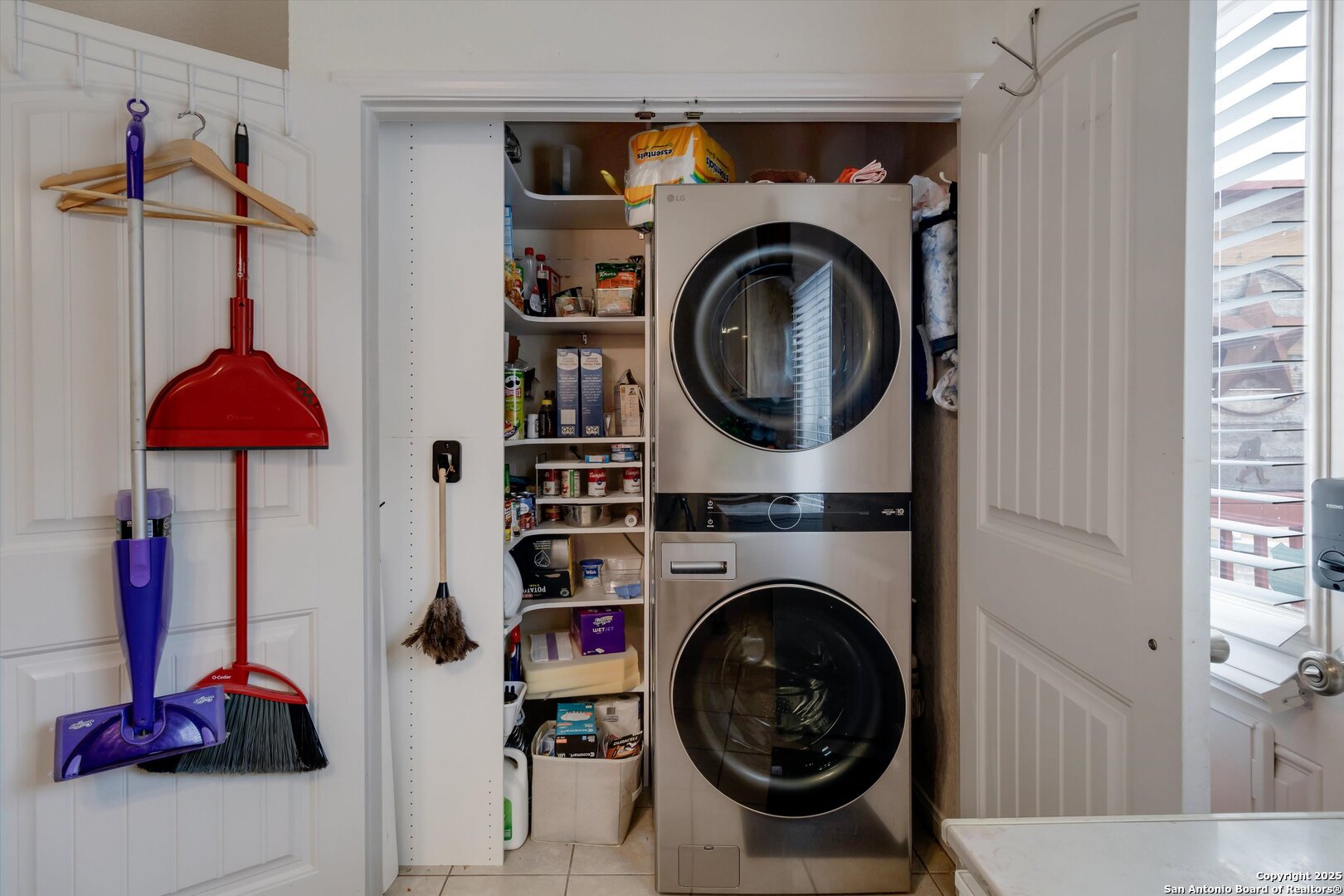 6016 Apache Moon Spring Branch, TX 78070 - Photo 11 of 32 a view of a storage and utility room with washer and dryer