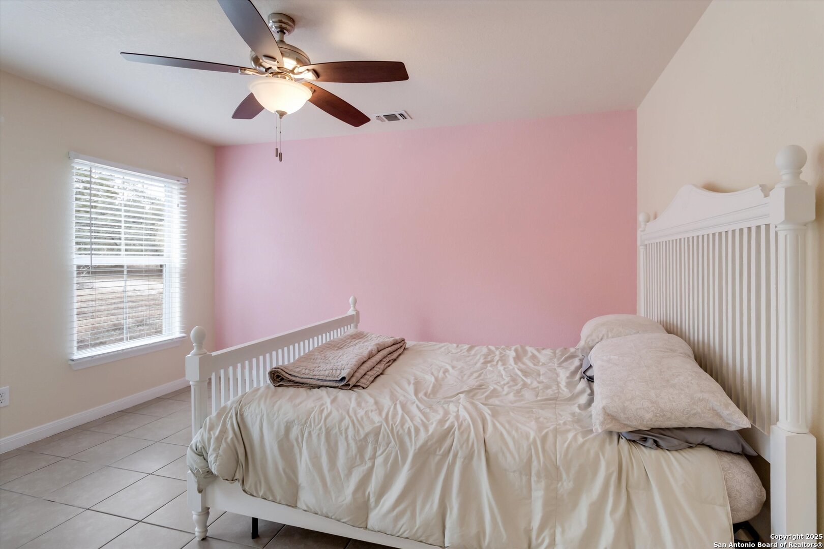 6016 Apache Moon Spring Branch, TX 78070 - Photo 17 of 32 a bedroom with a bed and a window