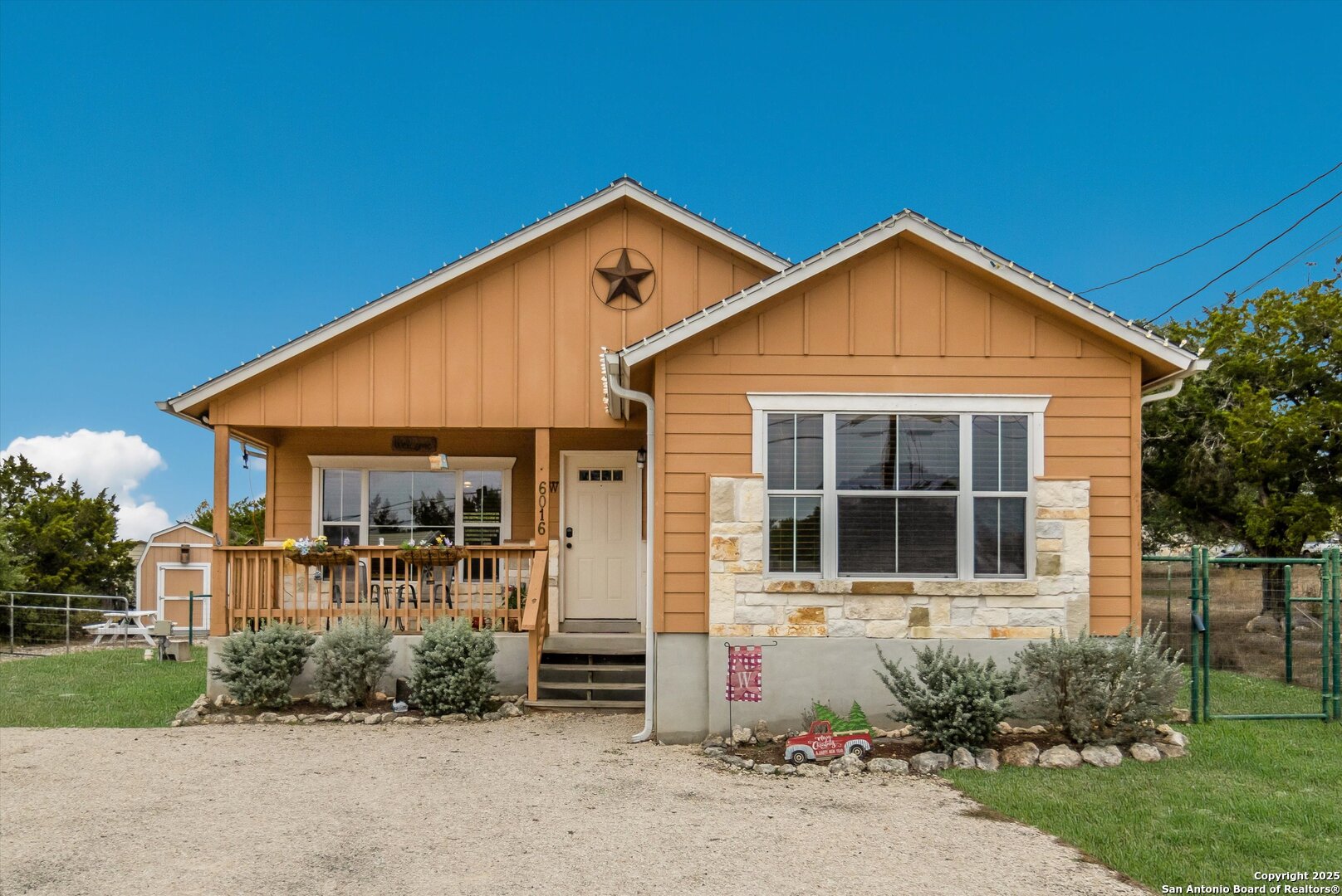 6016 Apache Moon Spring Branch, TX 78070 - Photo 2 of 32 a front view of a house with a yard