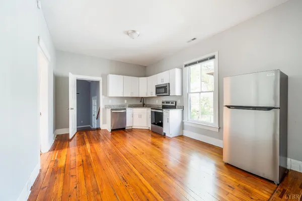 a view of a terrace with trees