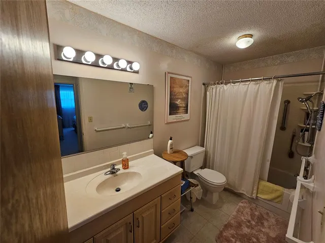 a view of a swimming pool with a lounge chairs