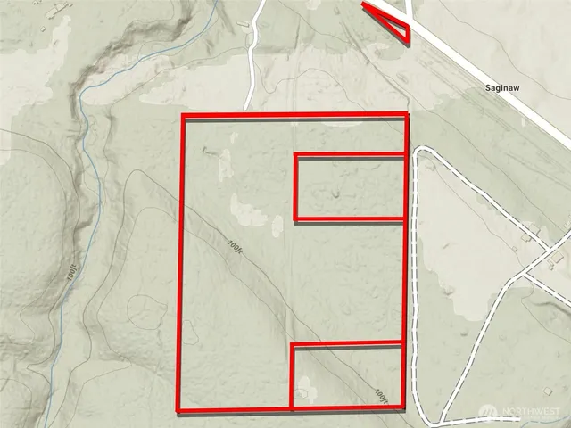 a sign that is sitting on a wooden fence