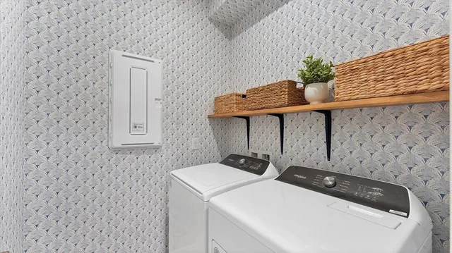 a utility room with dryer and washer