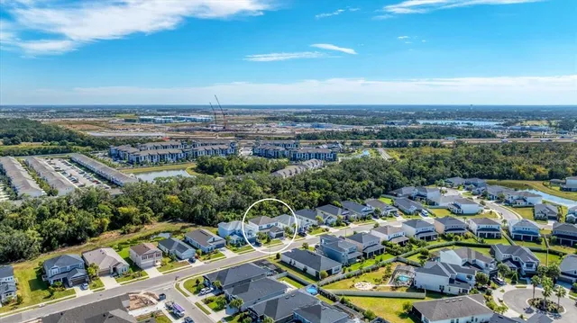 an aerial view of residential building with parking space