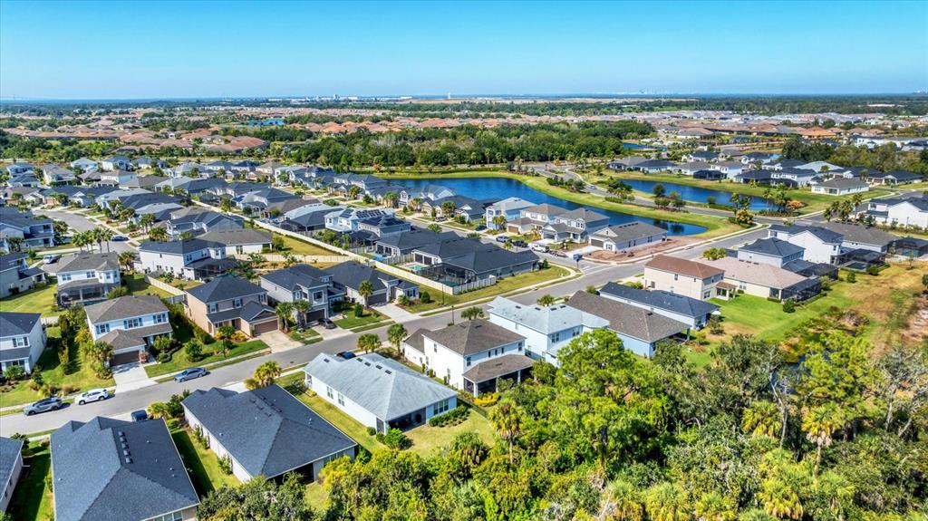5935 Maidenstone Way Palmetto, FL 34221 - Photo 38 of 52 an aerial view of residential building with parking space