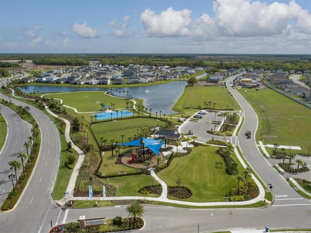 5935 Maidenstone Way Palmetto, FL 34221 - Photo 43 of 52 an aerial view of a swimming pool