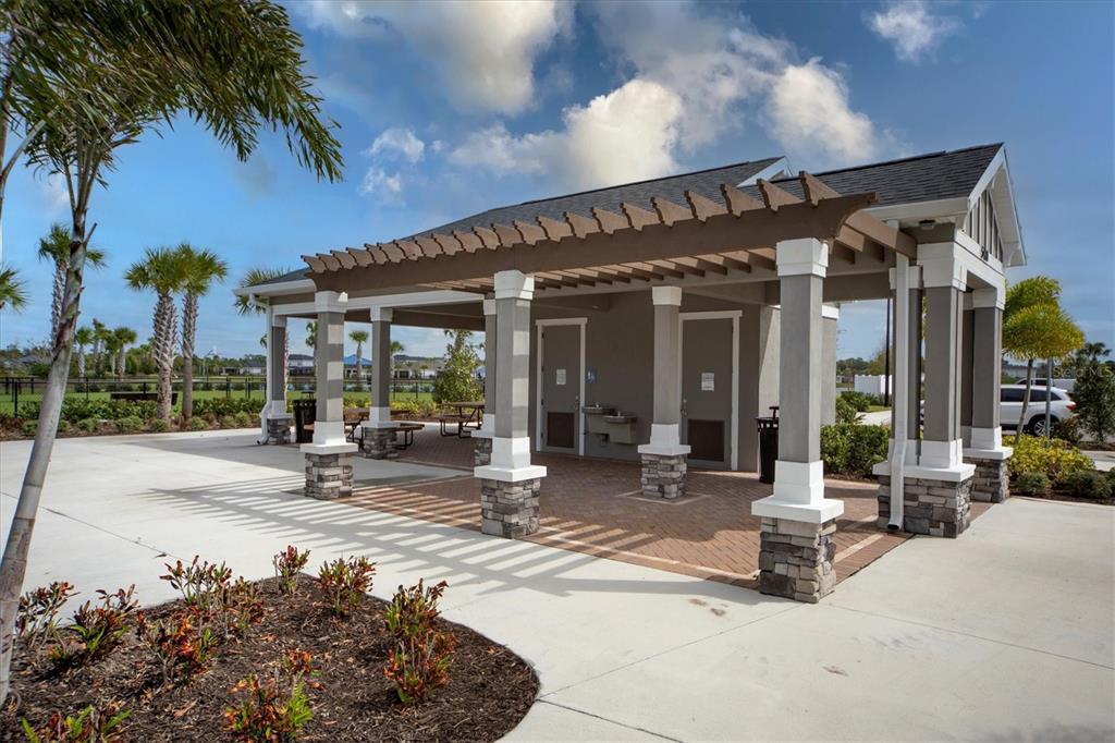 5935 Maidenstone Way Palmetto, FL 34221 - Photo 49 of 52 a view of a building with sitting area