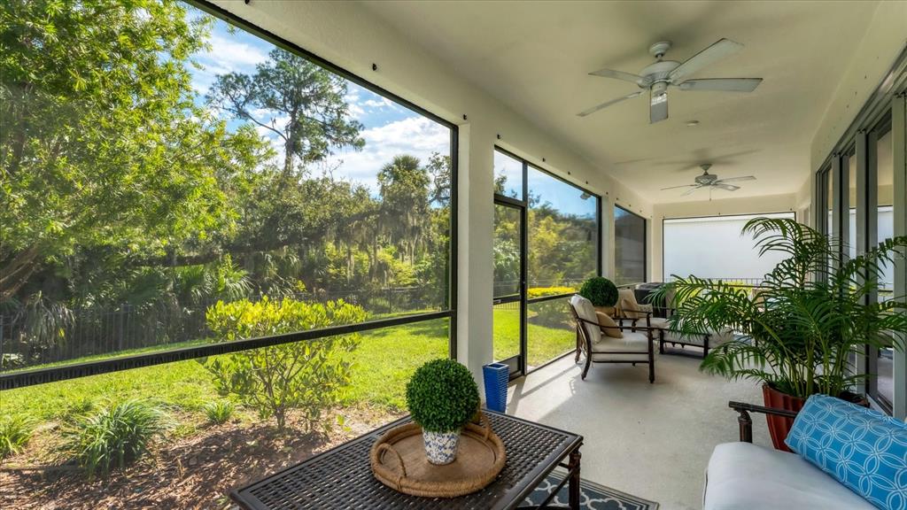5935 Maidenstone Way Palmetto, FL 34221 - Photo 5 of 52 a living room with furniture and a large window