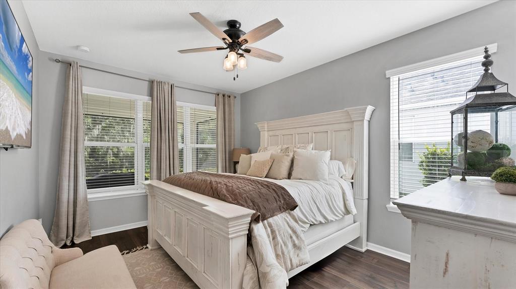 5935 Maidenstone Way Palmetto, FL 34221 - Photo 10 of 52 a bedroom with a large bed and a large window