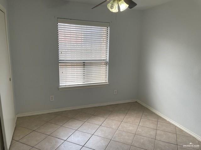 2432 West Iris Avenue McAllen, TX 78501 - Photo 5 of 16 an empty room with windows