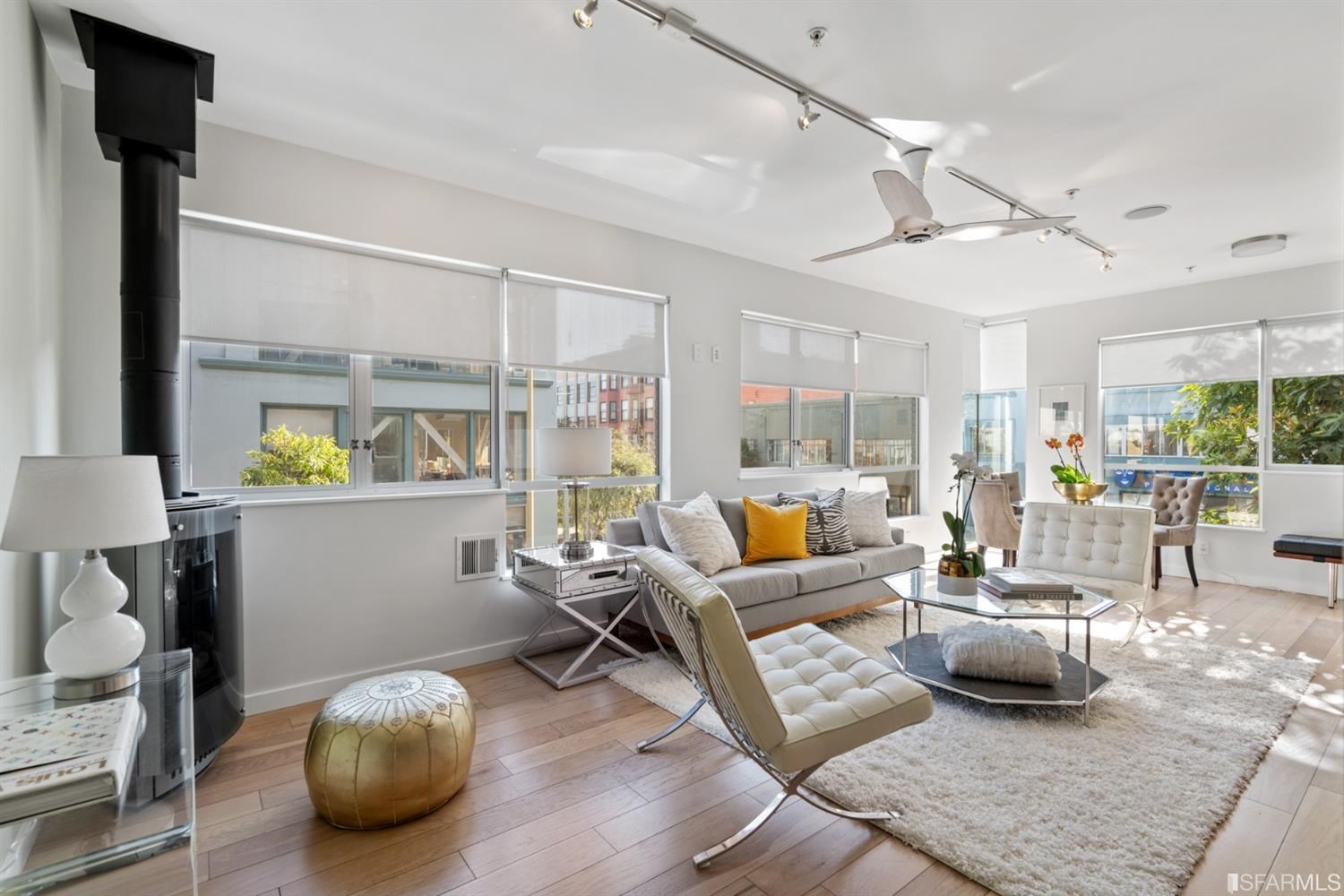 788 Minna, Unit 202 San Francisco, CA 94103 - Photo 1 of 11 a living room with furniture and a table