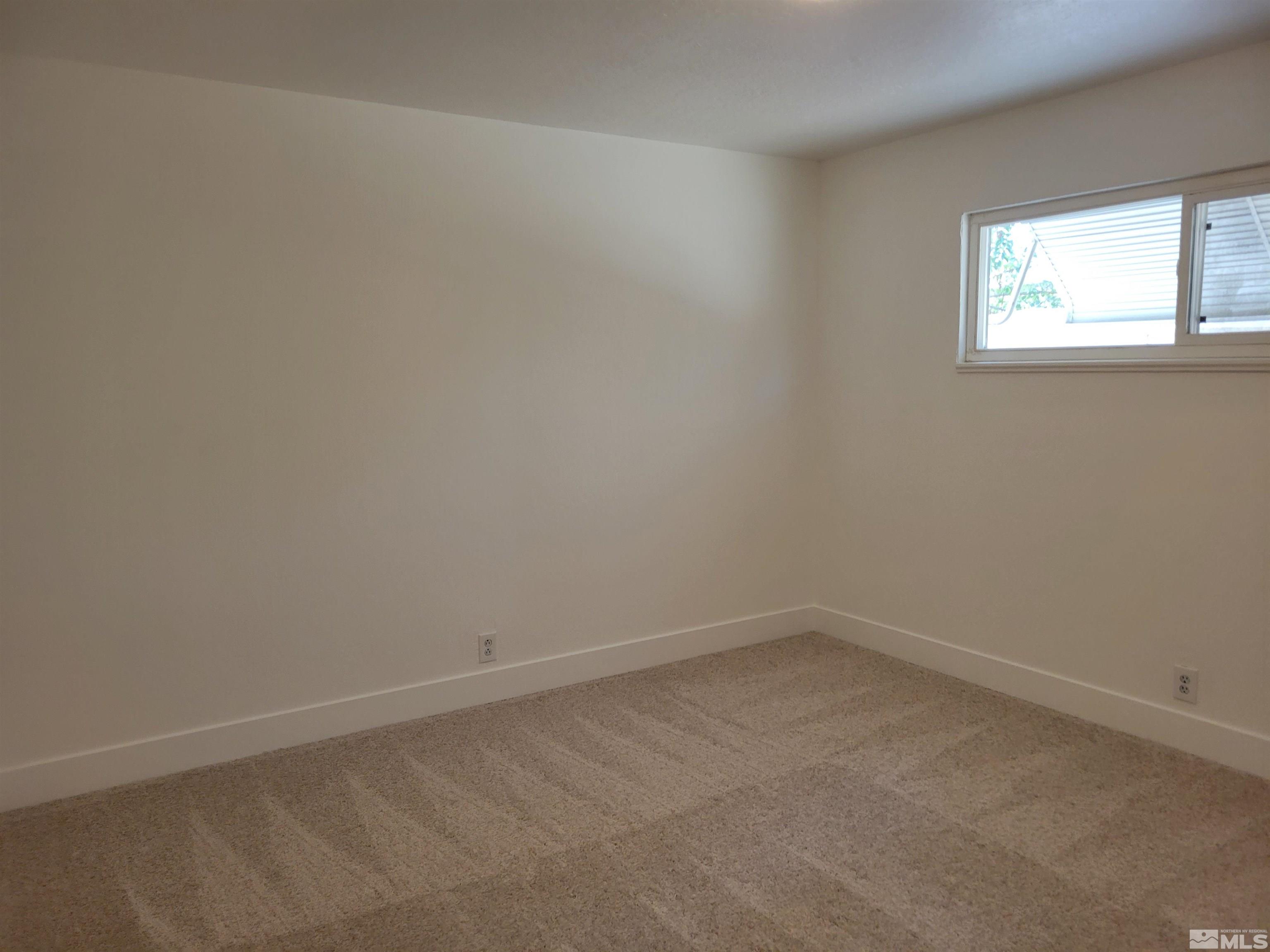 1801 Radcliffe Drive Reno, NV 89502 - Photo 11 of 18 an empty room with a window
