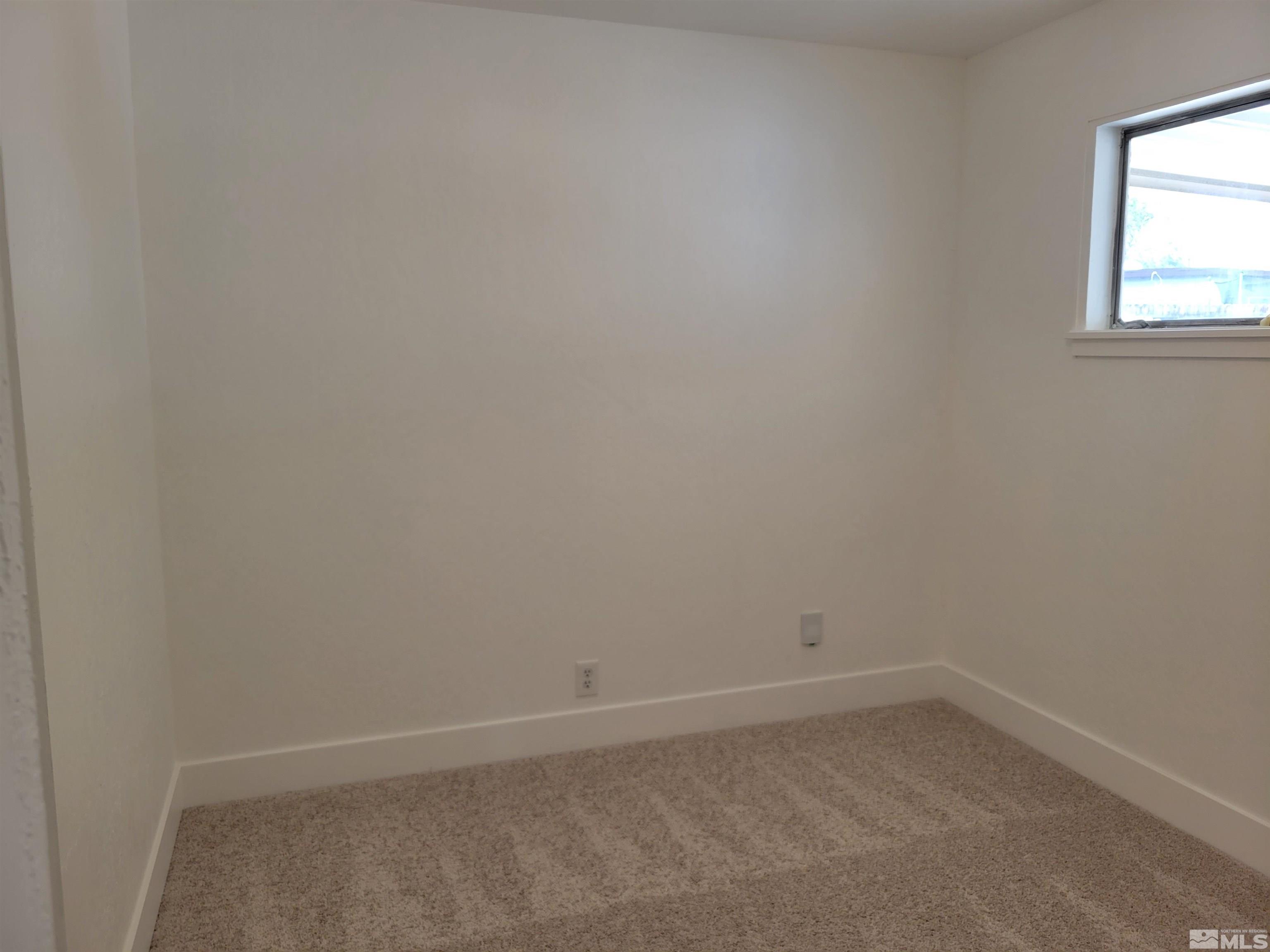 1801 Radcliffe Drive Reno, NV 89502 - Photo 12 of 18 an empty room with a window