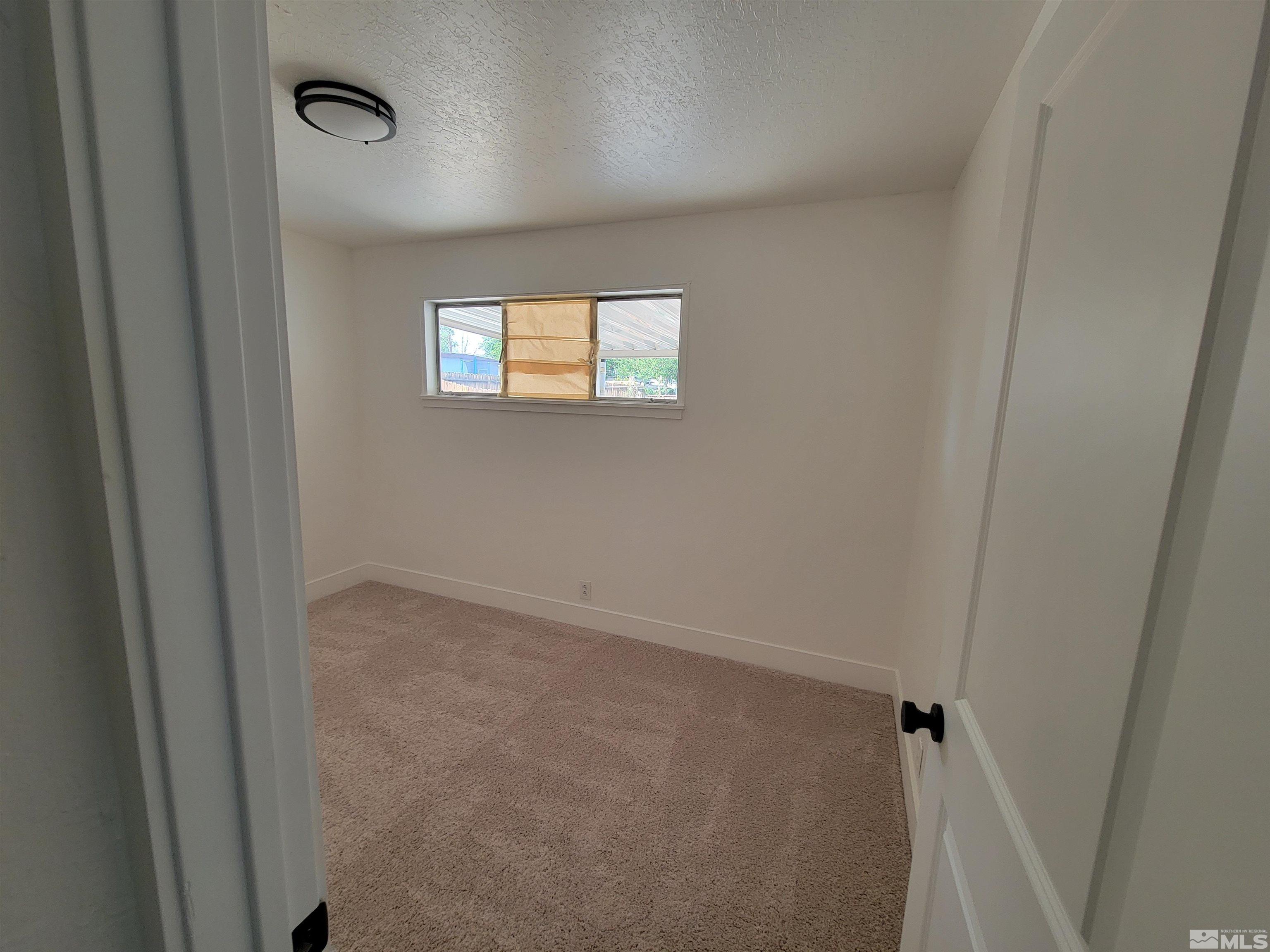 1801 Radcliffe Drive Reno, NV 89502 - Photo 7 of 18 a view of an empty room