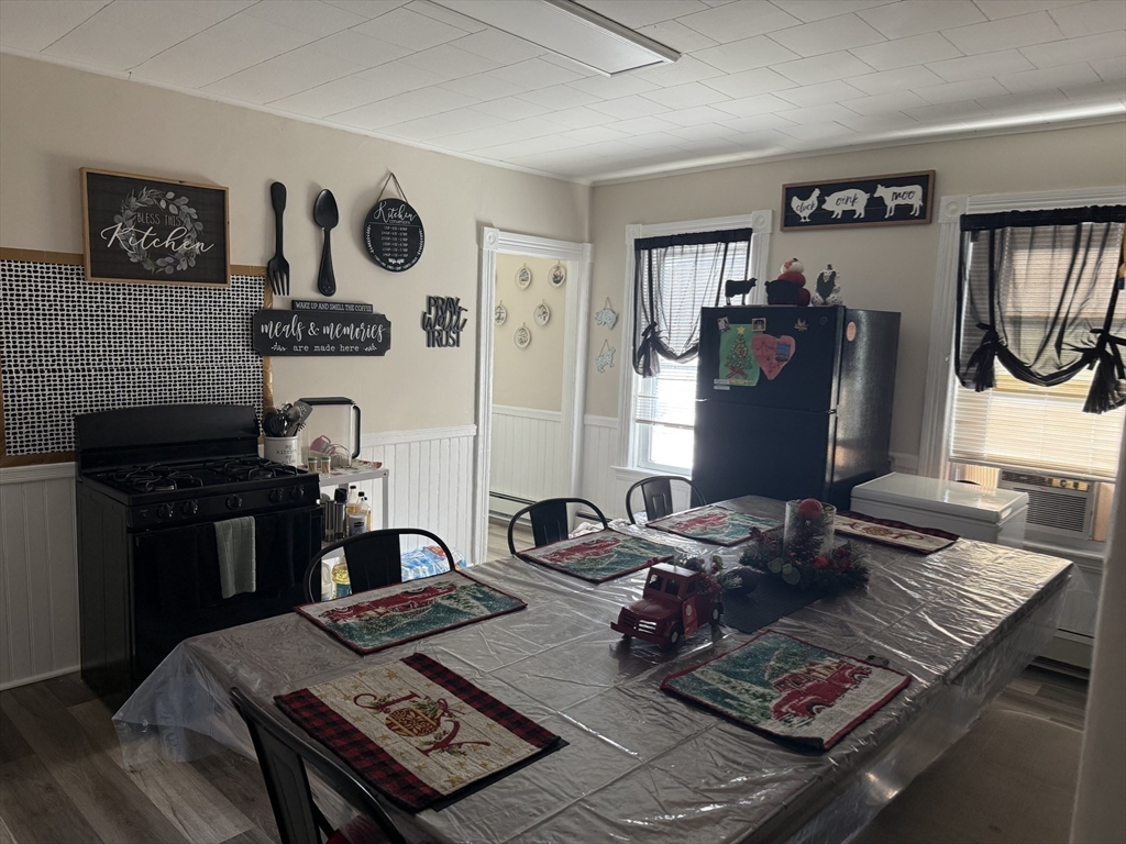 195 Millbury Street Worcester, MA 01610 - Photo 11 of 25 a living room with furniture and next to a window