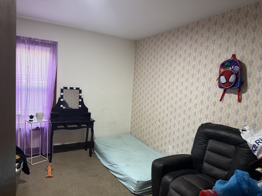 195 Millbury Street Worcester, MA 01610 - Photo 24 of 25 a living room with furniture