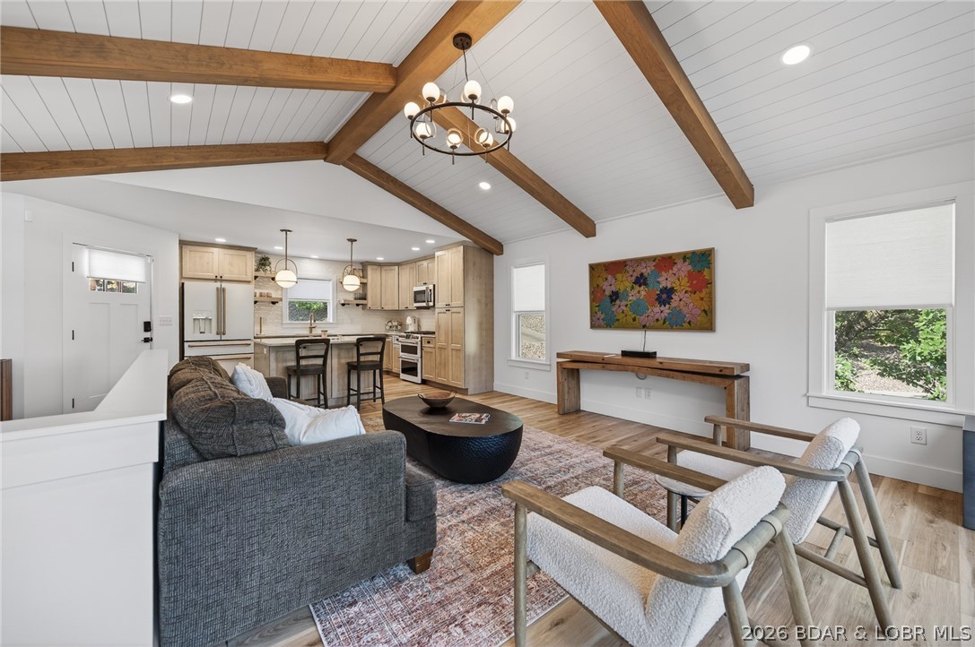 25 Old Sassafrass Road Eldon, MO 65026 - Photo 4 of 58 Vaulted ceilings, shiplapped and beamed with conte