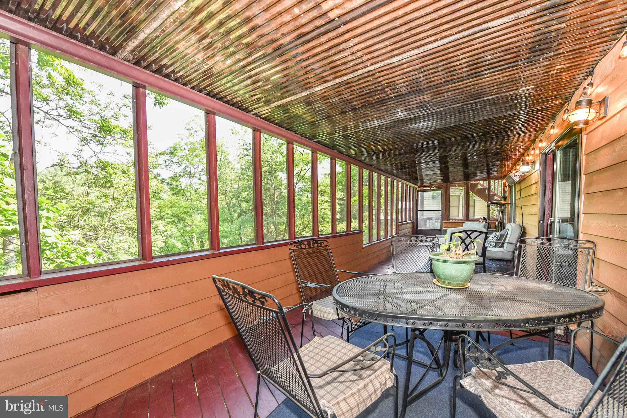 6951 Meadowlake Road New Market, MD 21774 - Photo 40 of 54 Morning coffee on your screened in porch?