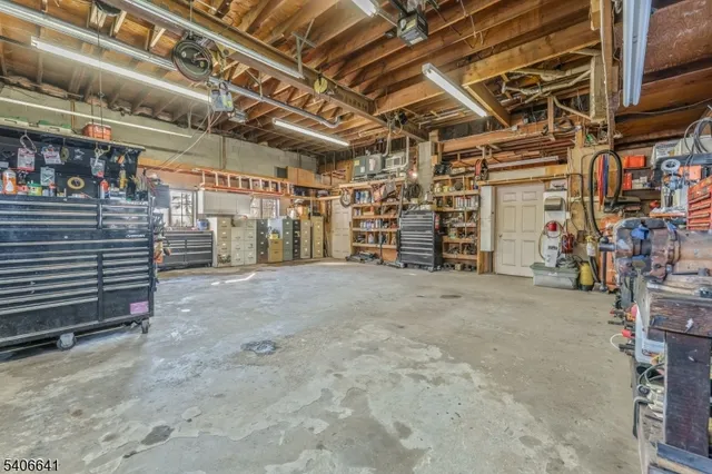 a view of empty room with wooden ceiling