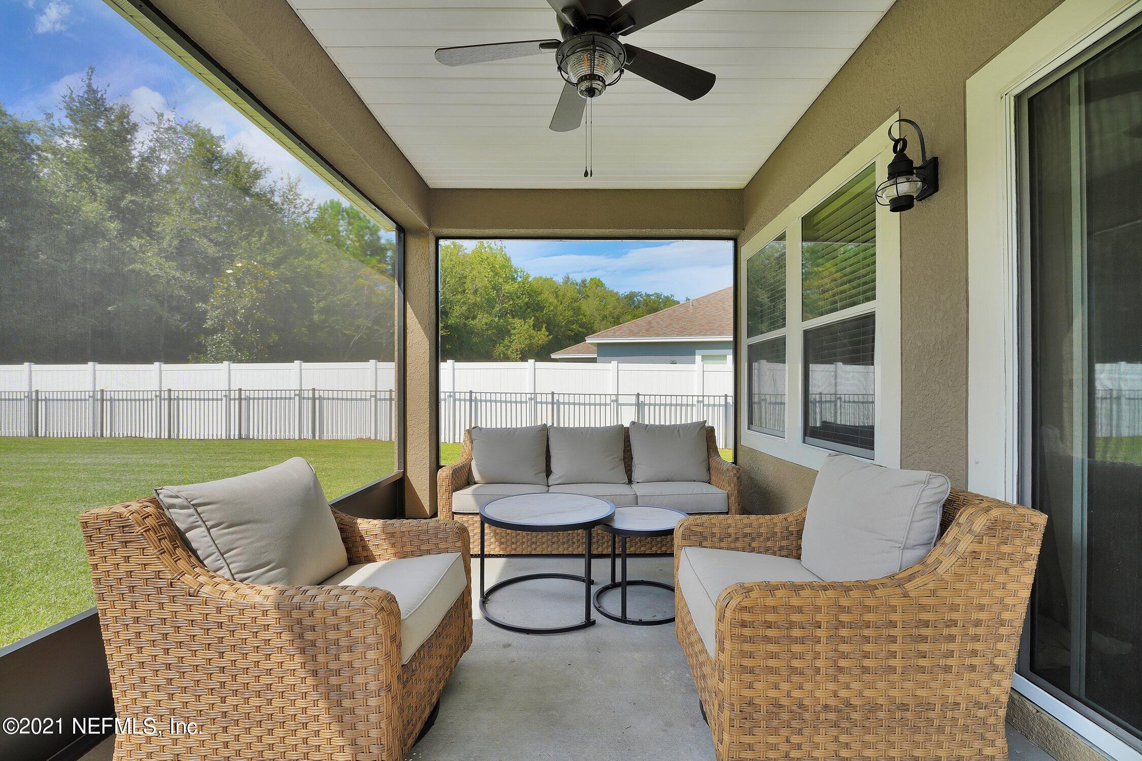 16342 Tisons Bluff Road Jacksonville, FL 32218 - Photo 26 of 57 a outdoor living space with furniture and a patio