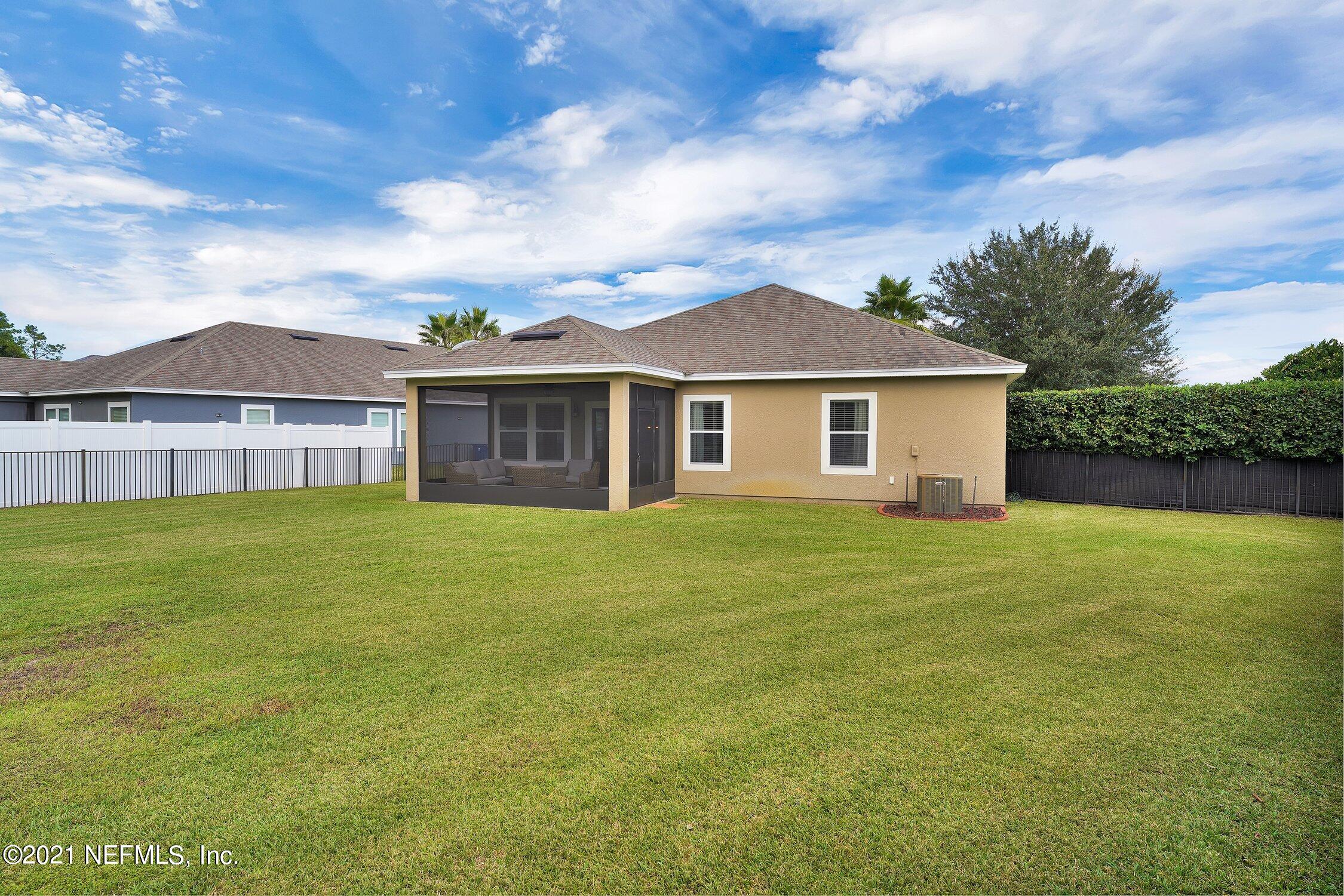 16342 Tisons Bluff Road Jacksonville, FL 32218 - Photo 32 of 57 a front view of a house with a garden