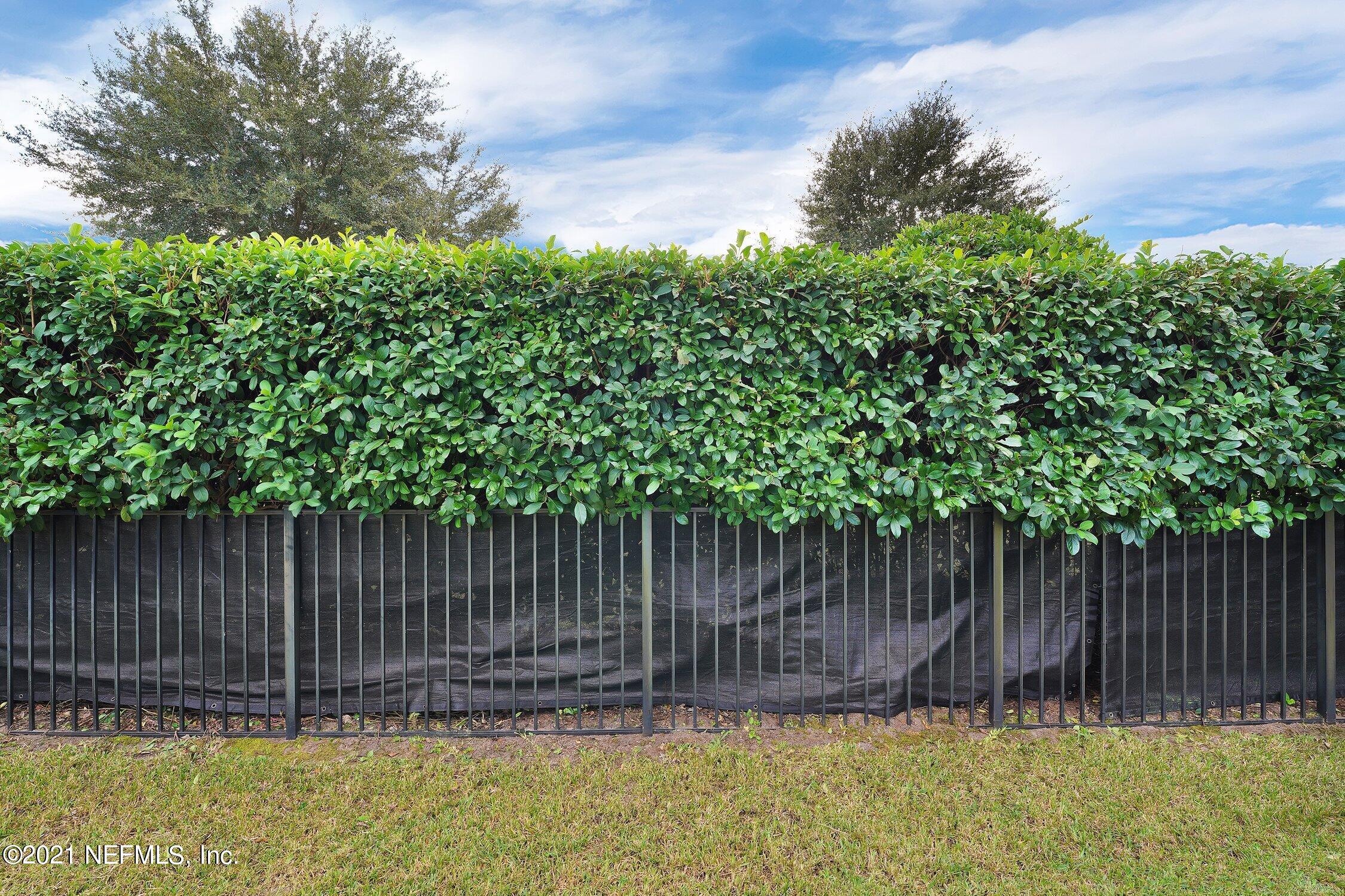 16342 Tisons Bluff Road Jacksonville, FL 32218 - Photo 33 of 57 a view of outdoor space with wooden fence