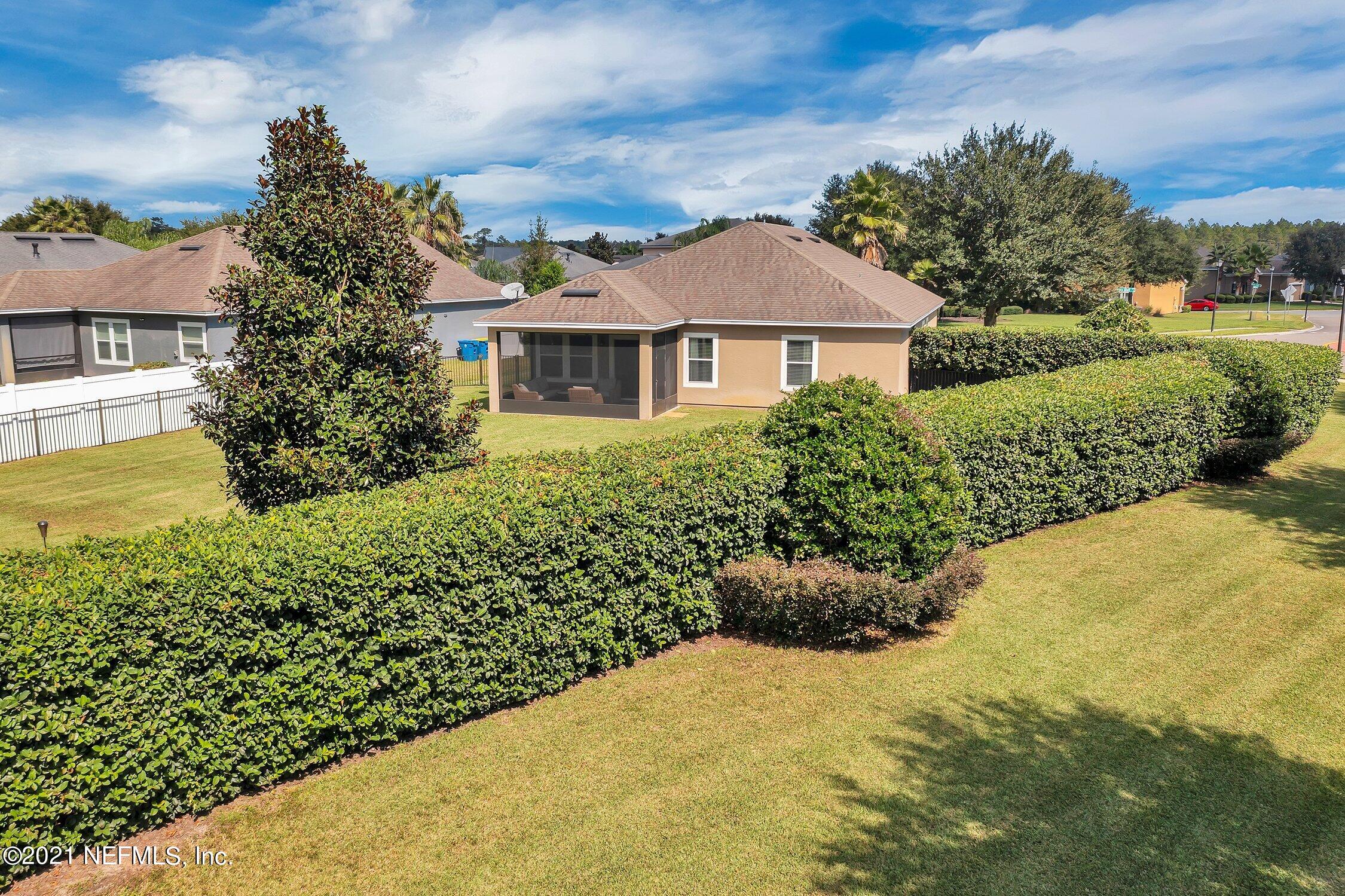 16342 Tisons Bluff Road Jacksonville, FL 32218 - Photo 46 of 57 a view of a house with a garden