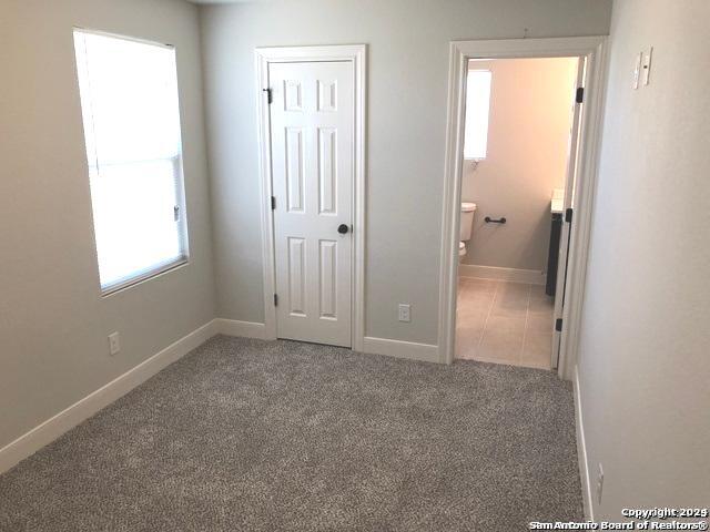 16719 Jupiter, Unit 3 Selma, TX 78154 - Photo 19 of 27 an empty room with windows