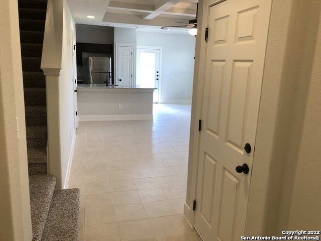 16719 Jupiter, Unit 3 Selma, TX 78154 - Photo 7 of 27 a view of a hallway with wooden floor