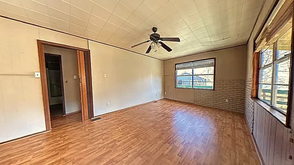 a kitchen with stainless steel appliances a stove refrigerator sink and cabinets