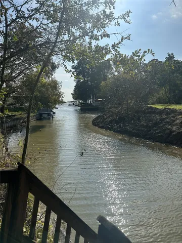 a view of a lake from a balcony