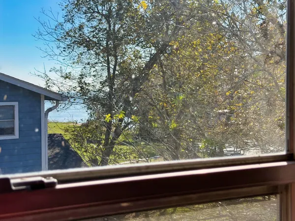 a view of a lake from a balcony