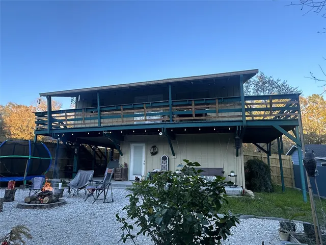 a view of a chair and table in a patio
