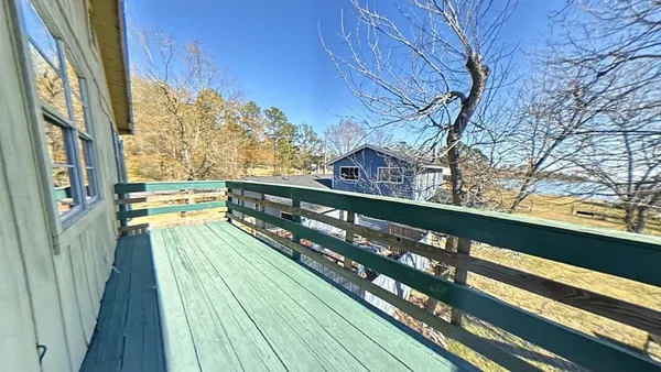 a view of swimming pool with patio