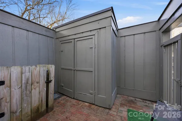 a view of entryway with wooden walls