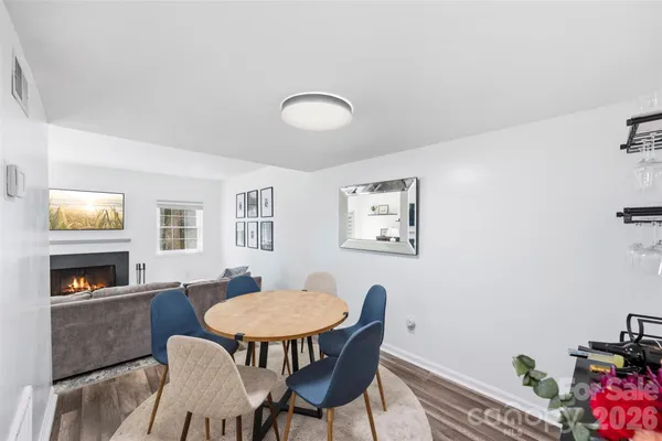 a view of a livingroom with furniture and a fireplace