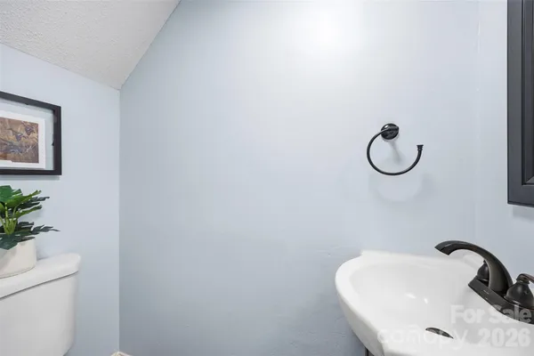 a bathroom with a sink and toilet