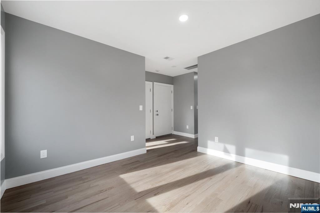 149 Florence Avenue, Unit 2 Hawthorne, NJ 07506 - Photo 6 of 9 a view of a room with wooden floor