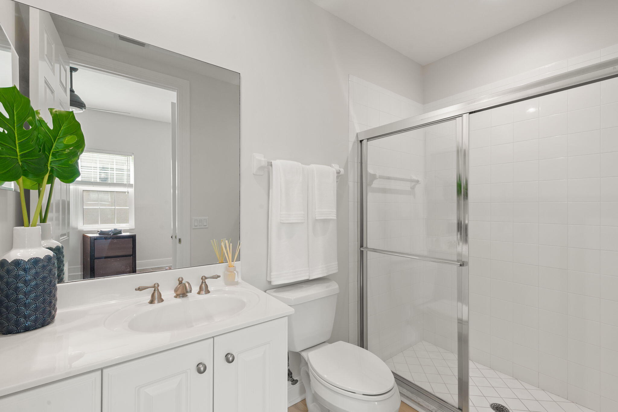9213 Museo Circle, Unit 103 Naples, FL 34114 - Photo 20 of 47 a bathroom with a sink toilet and shower