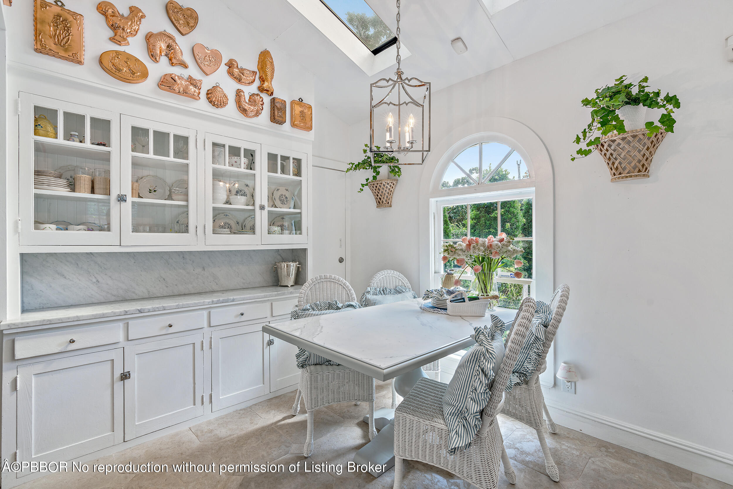 204 Westminster Road West Palm Beach, FL 33405 - Photo 6 of 16 a view of a dining room with furniture a livingroom and chandelier