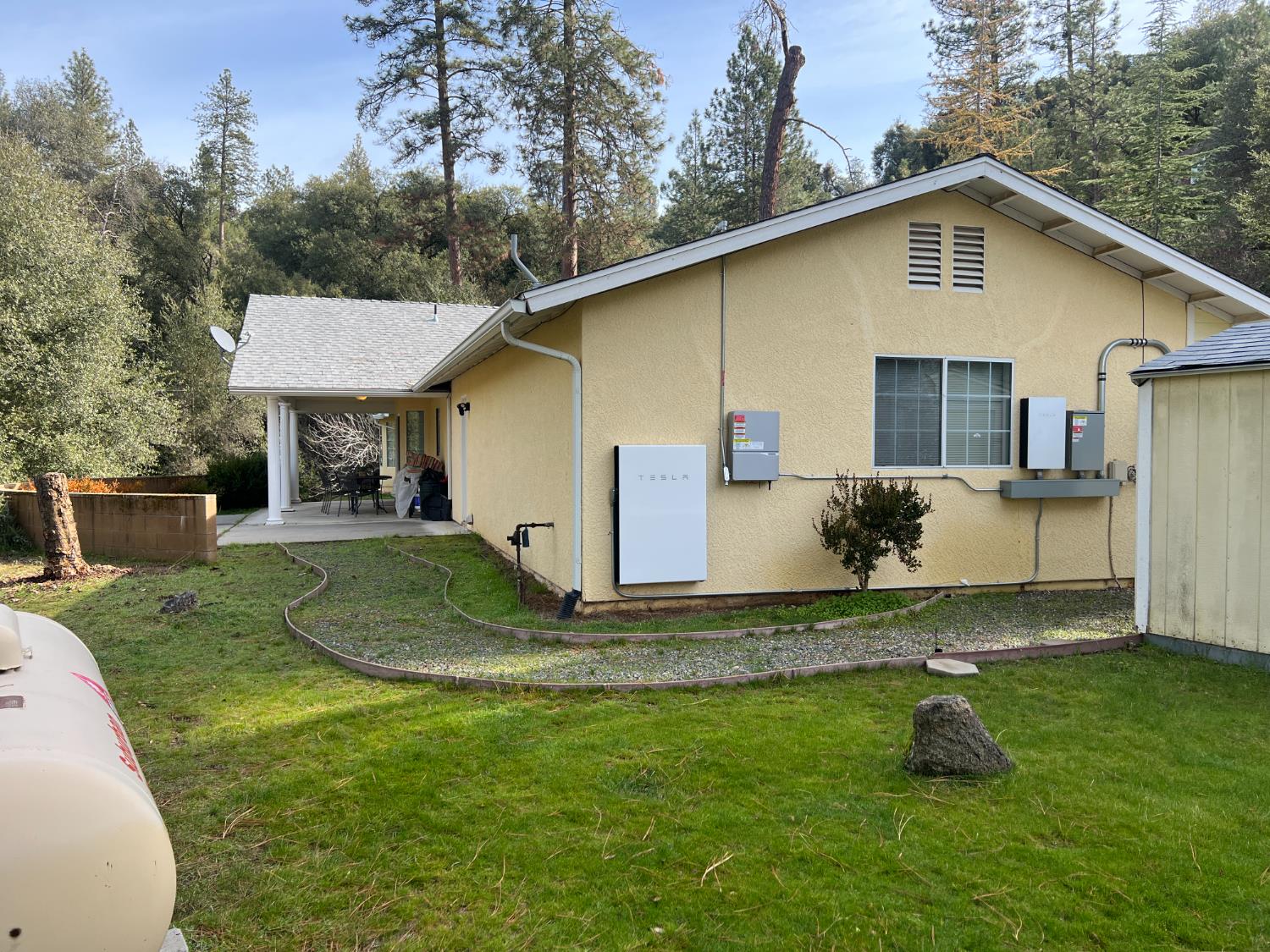 50613 Granite Butte Way Oakhurst, CA 93644 - Photo 27 of 31 a front view of a house with a yard
