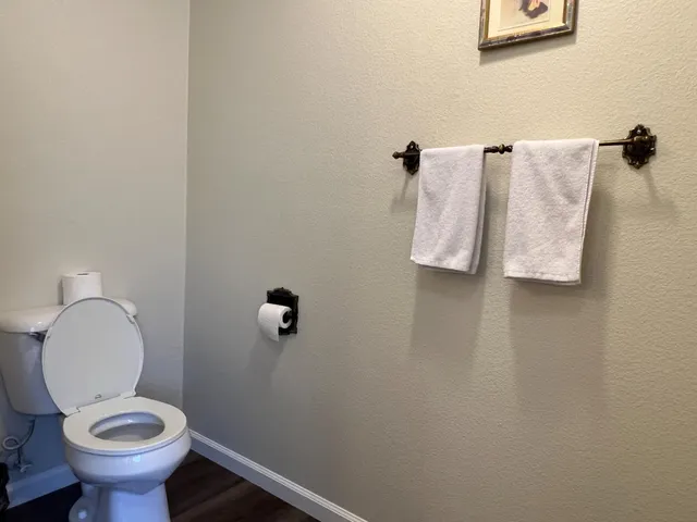 a bathroom with a toilet and a sink