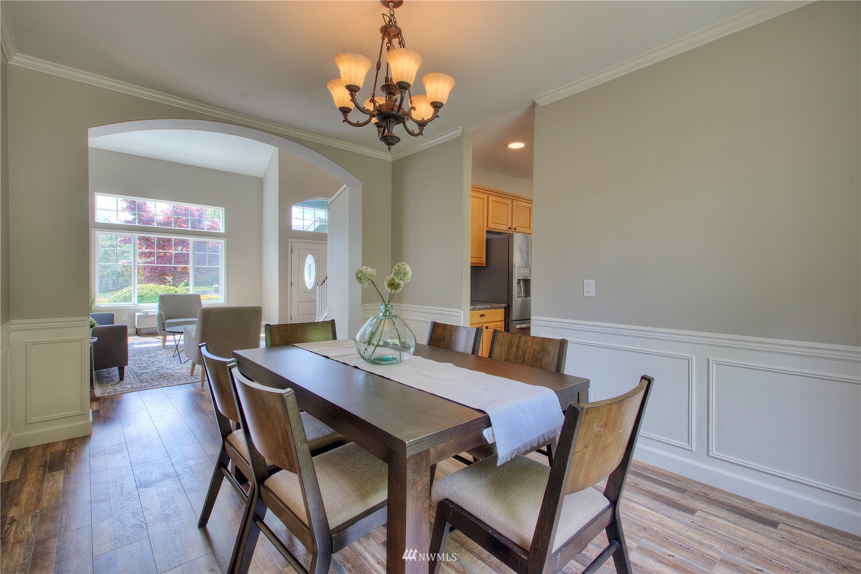 1127 R Street Northwest Auburn, WA 98001 - Photo 11 of 37 a view of a dining room with furniture and wooden floor