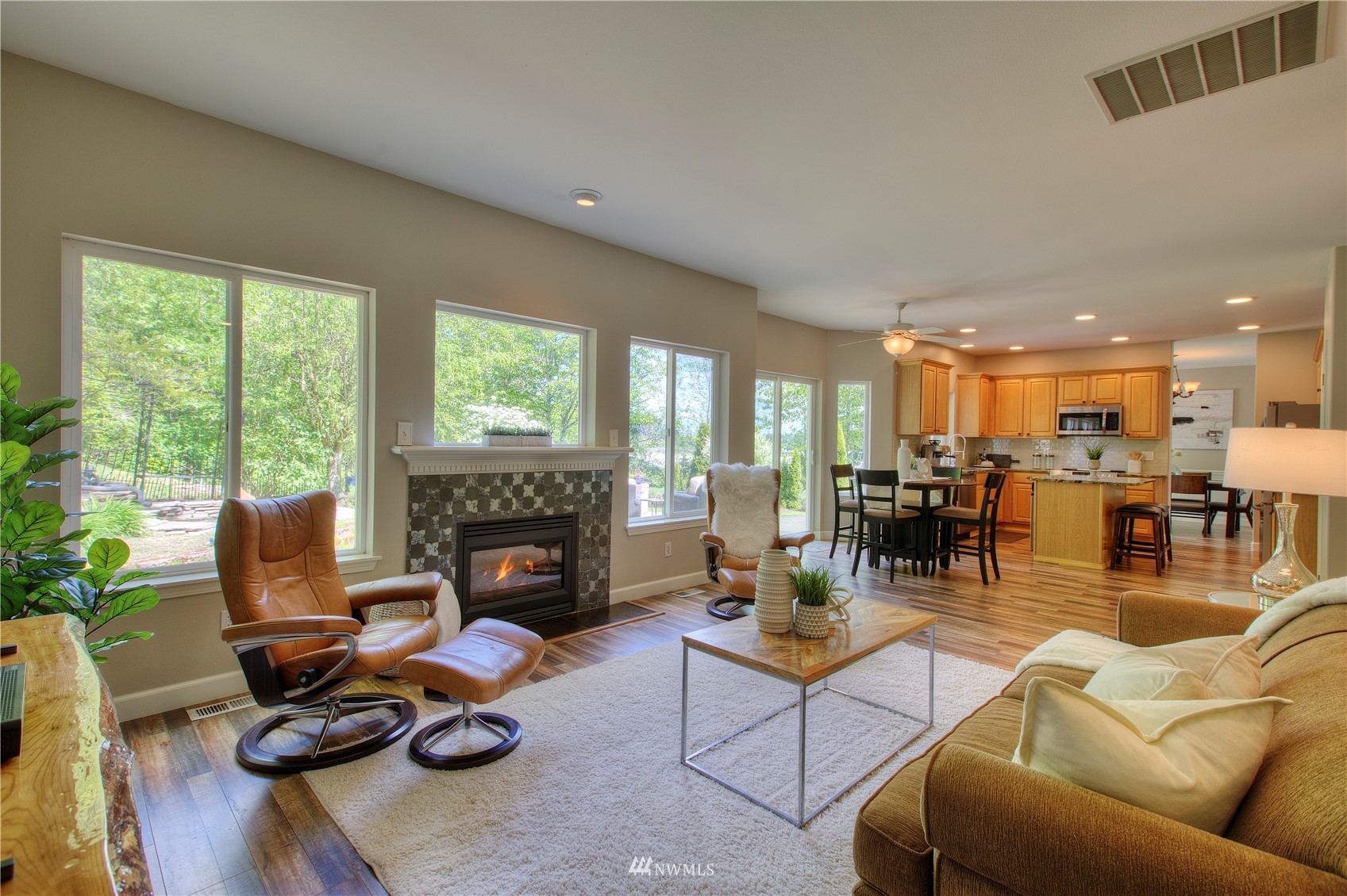 1127 R Street Northwest Auburn, WA 98001 - Photo 17 of 37 a living room with furniture fireplace and a large window