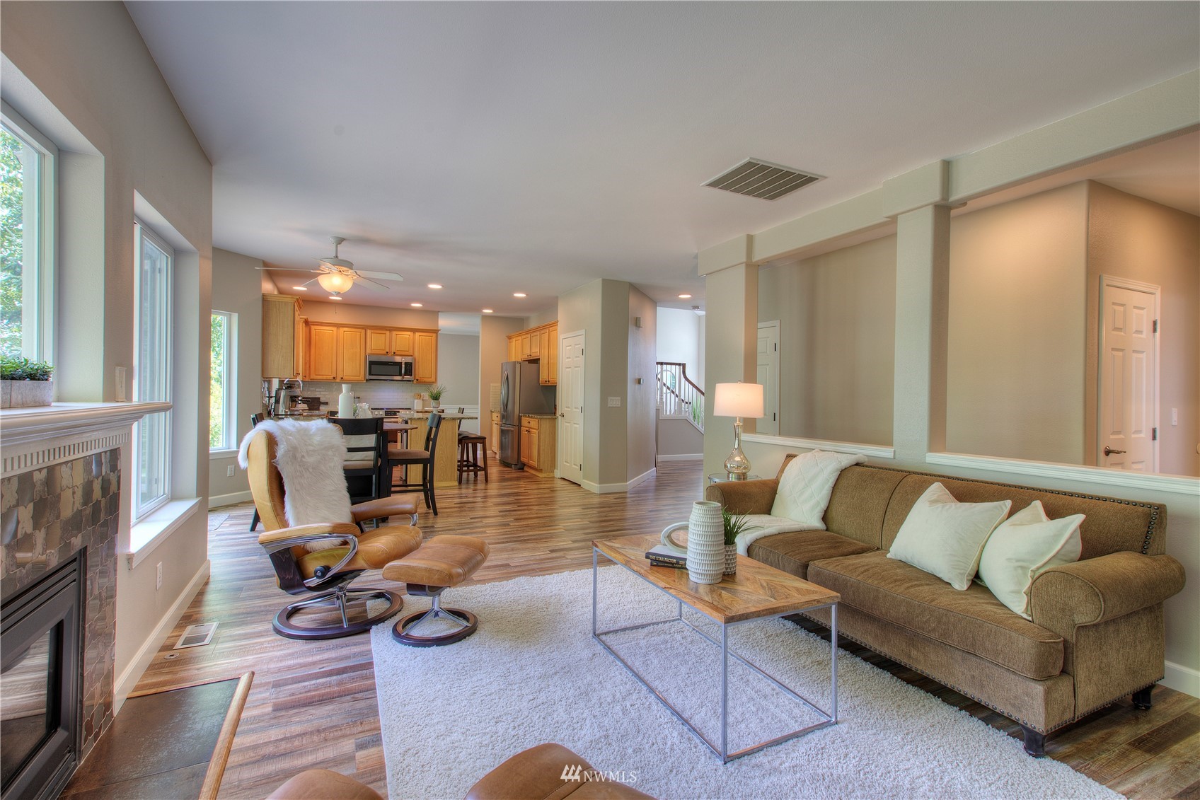 1127 R Street Northwest Auburn, WA 98001 - Photo 18 of 37 a living room with furniture gym equipment and a large window