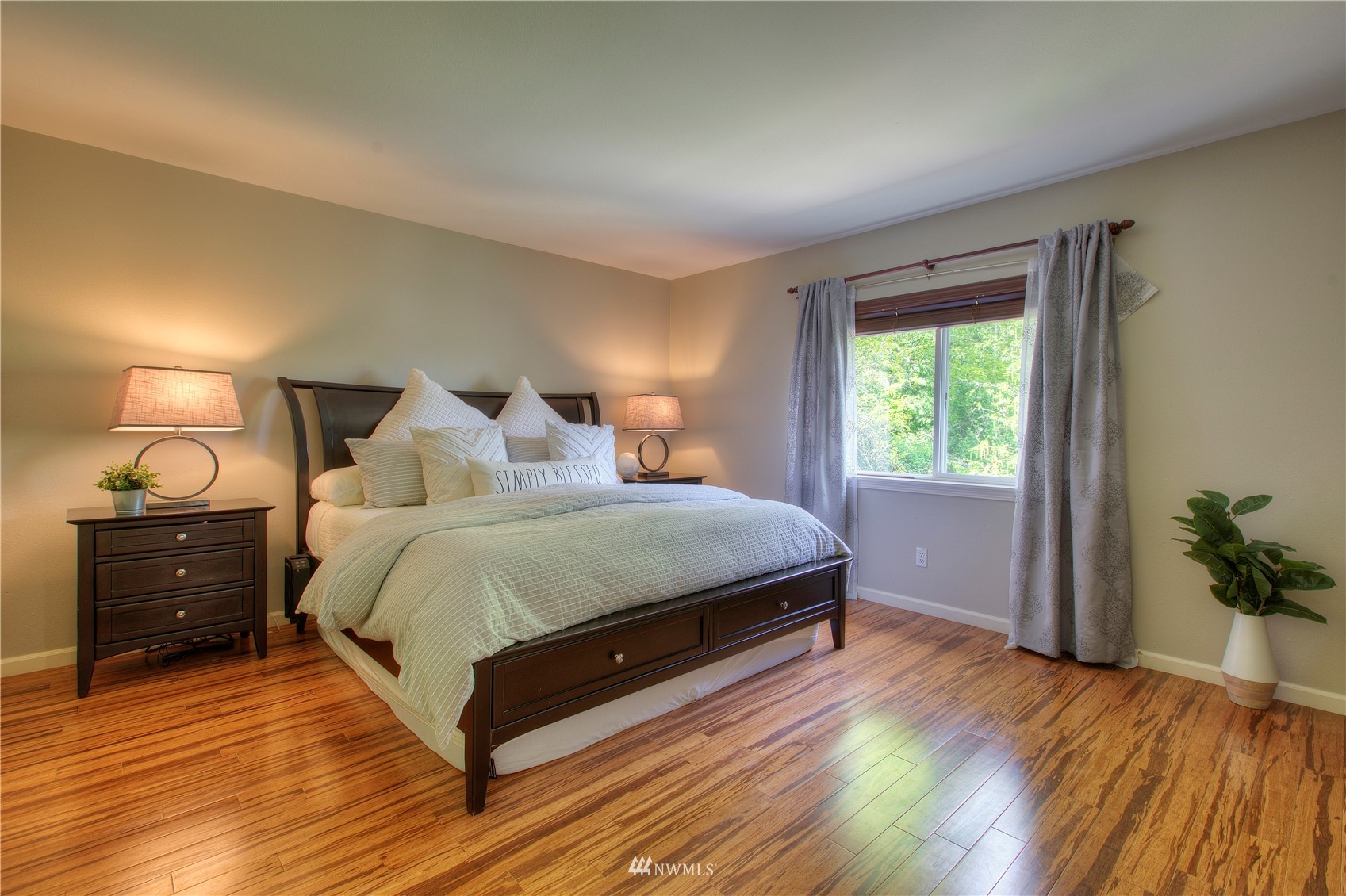 1127 R Street Northwest Auburn, WA 98001 - Photo 21 of 37 a bedroom with a bed and a window
